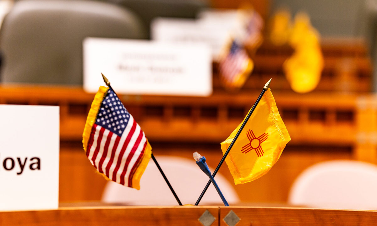 This is a photo of the United States of America and New Mexico flags.